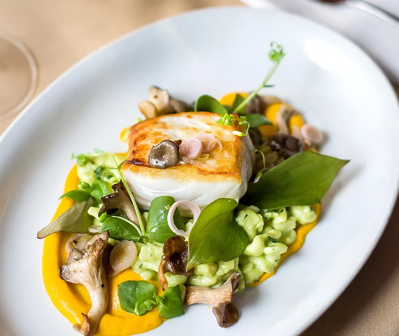 gourmet white fish dish with mushrooms